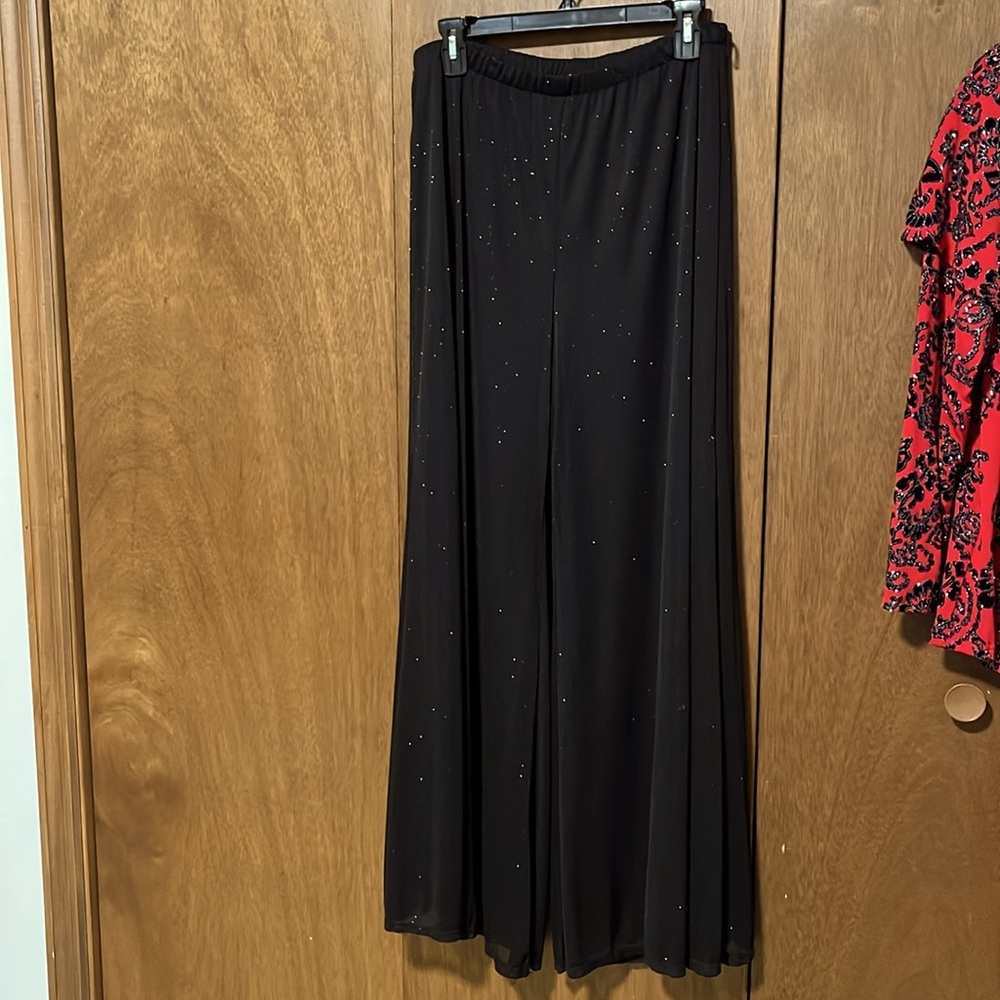 black shimmery wide leg pants. Perfect for special occasions!